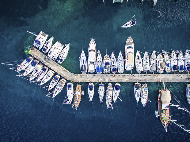 Aerial view on marina bay with sailboats and yachts. http://santoriniphoto.com/Template-Sailing.jpg